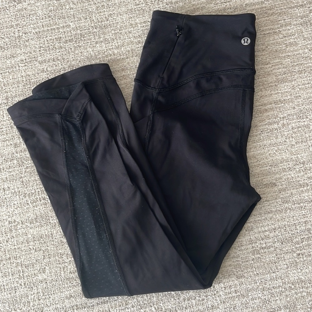 Lululemon High-Rise Black Tight Luxtreme fabric with mesh detailing crop length